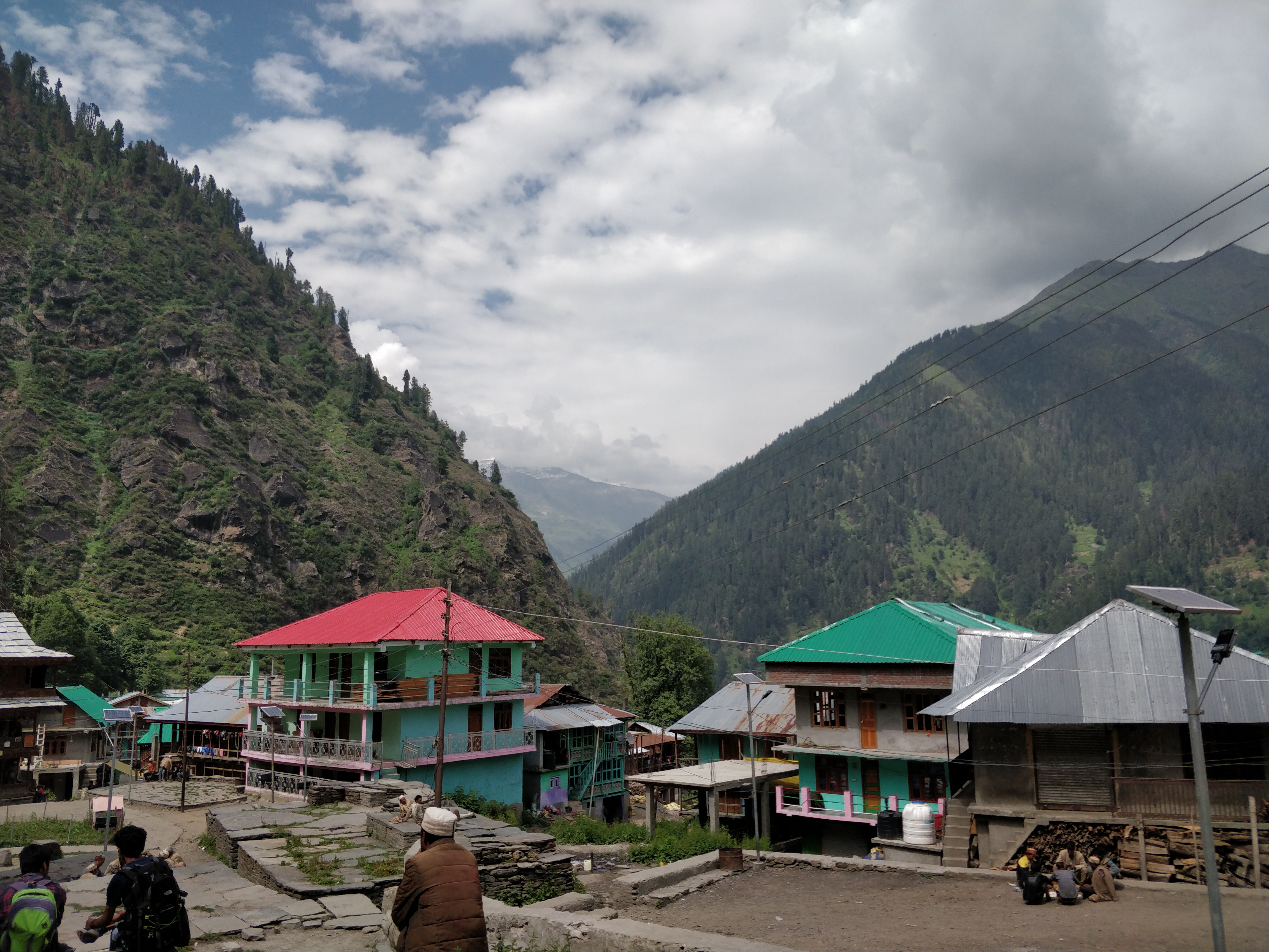 View of Malana villagein Himachal Pradesh, India; showing the local houses and residents.
